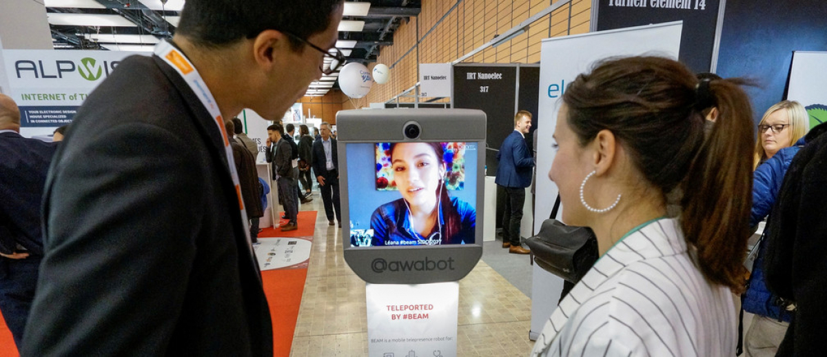 Modern technology - including telepresence and machine translation - is driving a new era of globalization. Image: REUTERS/Robert Pratta